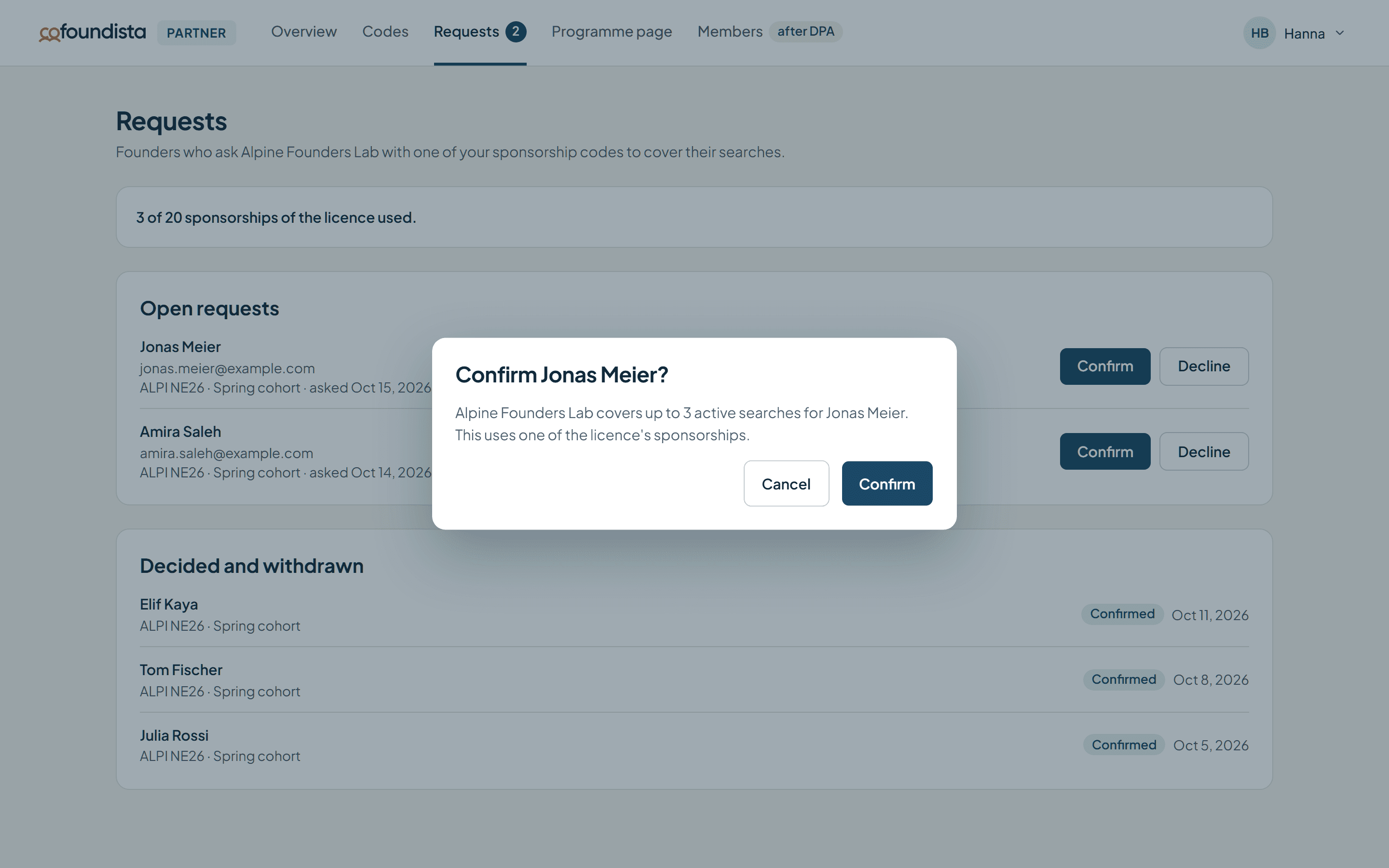 The partner portal on a laptop: two open requests, and the question before a sponsorship is confirmed.